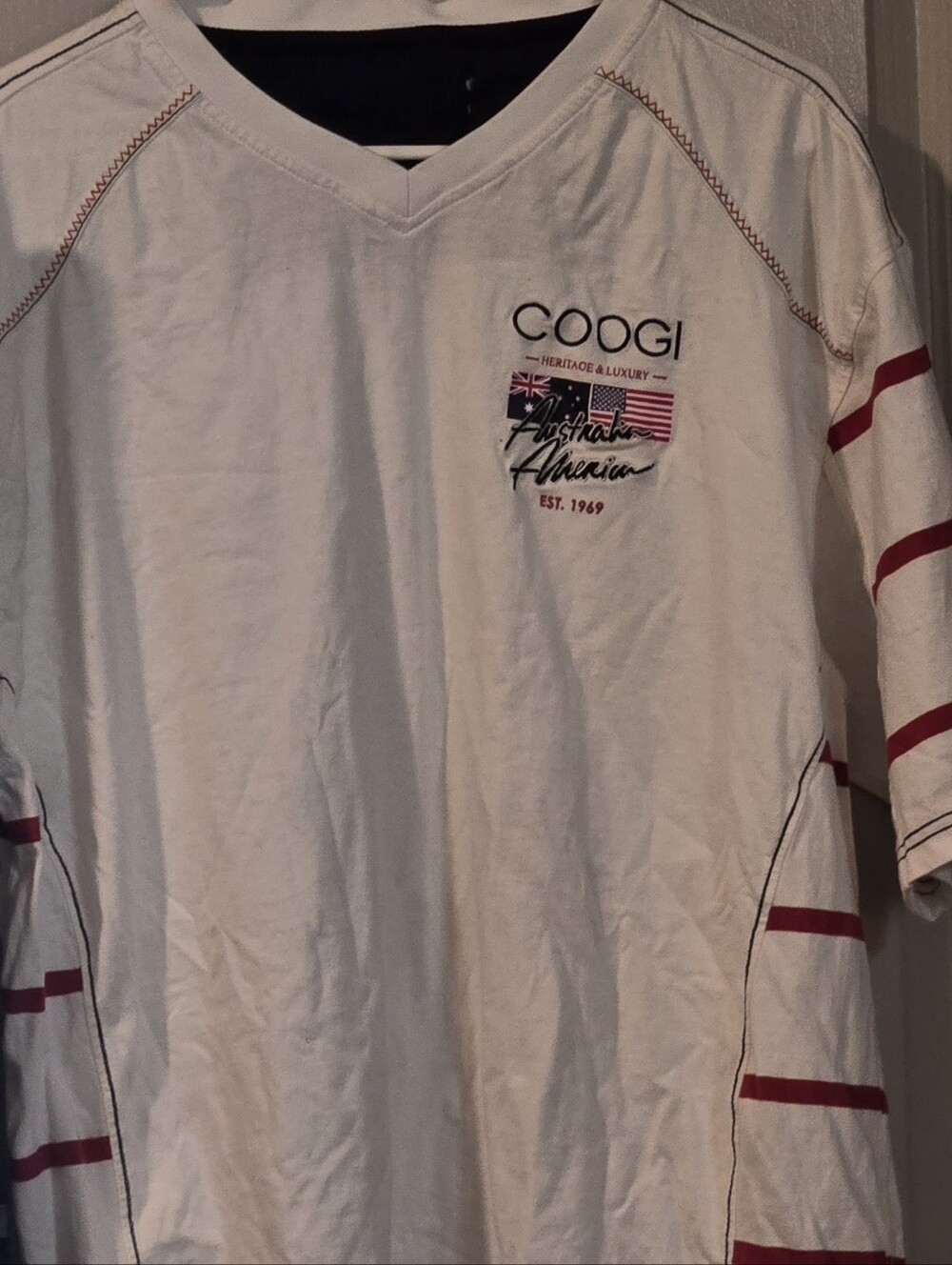 COOGI White V-Neck Short Sleeve Shirt with Red Stripe Accents